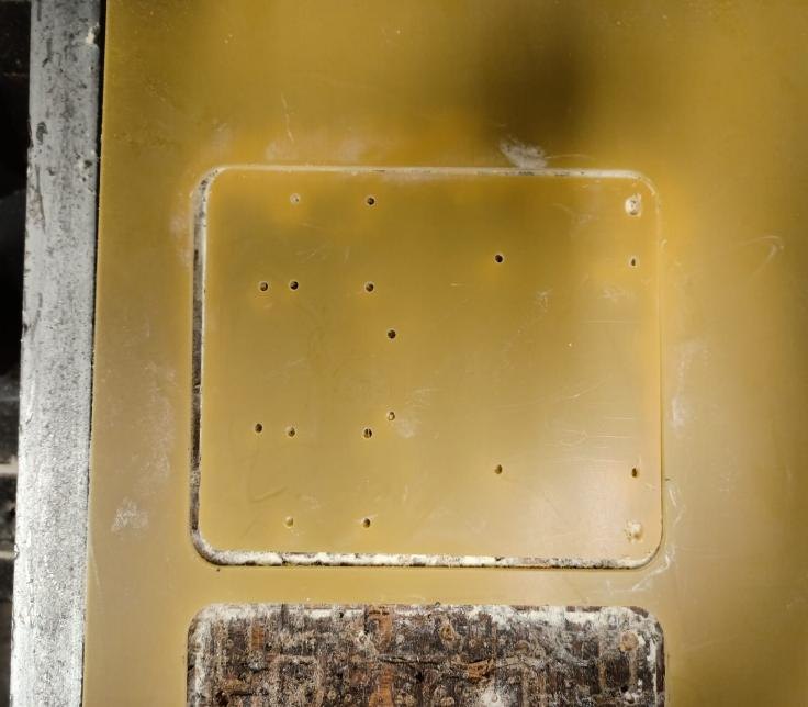 The vehicle base plate being machined on a CNC router